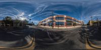 an empty city street with no traffic and no cars at all is shown in this distorted photograph