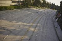 an overhead view looking down at a yellow line on a street in an empty city
