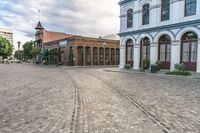 the cobblestones in an old brick road are being painted with different shades and textures