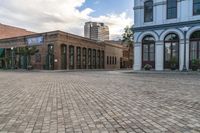 the cobblestones in an old brick road are being painted with different shades and textures