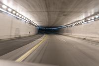 this is the view from a moving car that was in a tunnel, as it speeds through