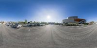 an empty car park is shown in a fish - eye view shot with no lens