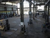 an image of a factory building with lots of equipment in it that is really old