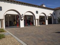 the fire station is located at the front of the building with arches and arches on the side