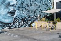 Los Angeles Graffiti: A Bicycle Wheel on the Road