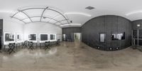 an empty hair salon with desks, hair mirrors and lights on the walls and windows