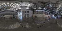 an airplane parked inside of the hangar on a cloudy day, and viewed in 3d