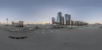 a wide angle view of cityscaping in the evening sky, with no cars and no vehicles