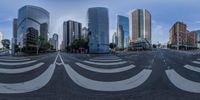 the street has been turned into an oval mirror with a wide angle on it's sides