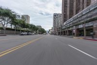 Driving Through Los Angeles: Highway with Motion Blur and Clouds