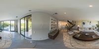 two fisheye photos show an elegant interior and a large white room in the middle