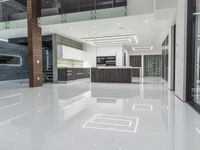 a clean looking and modern looking kitchen, with light coming through the floor to the ceiling