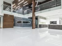 a clean looking and modern looking kitchen, with light coming through the floor to the ceiling