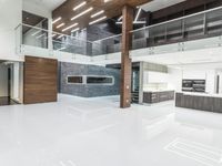 a clean looking and modern looking kitchen, with light coming through the floor to the ceiling