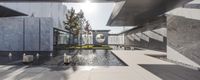 the pool and outdoor lounge areas of the museum of art and design, in los angeles