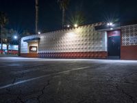 a night time shot of a food and beverage business at dusk with its lights on