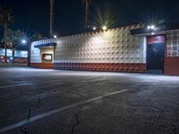 a night time shot of a food and beverage business at dusk with its lights on