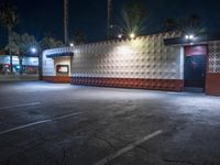 a night time shot of a food and beverage business at dusk with its lights on