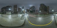 an image of some buildings in the city at night time time on a skateboard ramp