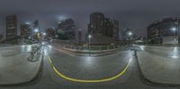 an image of some buildings in the city at night time time on a skateboard ramp