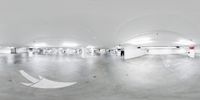 the empty parking garage in an underground area of the city at night, in a panoramic view