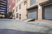 a skateboard ramp outside a building that is attached to it's front door