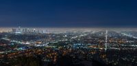 the city lights are bright and clear from within the sky as seen from above los at night