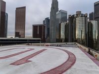 a man is skateboarding in the background of some tall buildings near one another,