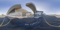 a 360 - shot is showing the sky and some buildings as if in a video