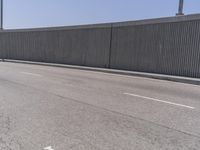 Los Angeles Urban Street: Metal Fence and Cityscape