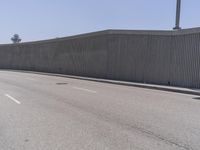 Los Angeles Urban Street: Metal Fence and Cityscape