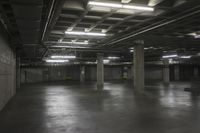 an empty storage room in an industrial building with light coming from the window above the ceiling