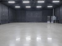 this is an image of a large empty warehouse with a door that opens on either side