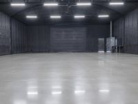 this is an image of a large empty warehouse with a door that opens on either side