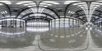 an empty warehouse is filled with lots of windows and an area for people to walk