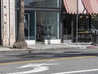 an open and empty storefront with no cars parked in front of it's door