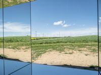 Lush Green Field in Europe: Clear Skies and Tranquility