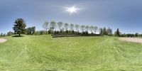 a 360 - turn panorama of a golf course in canada on the sunny day of the day