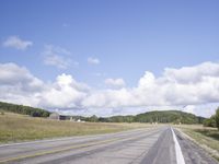 Lush Green Highlands Road: Connecting with Nature amidst the Clouds