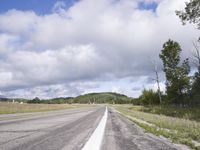 Lush Green Highlands Road: Connecting with Nature amidst the Clouds
