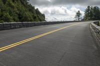 the yellow and white road has two lanes, passing each other on two different sides