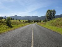 Lush Landscape Road with Mountain Scenery