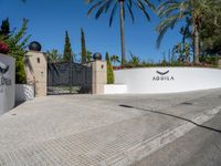 entrance gate at the luxury estate of aquaqualia, located in palm beach gardens