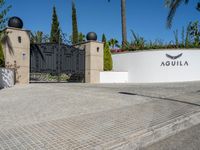 entrance gate at the luxury estate of aquaqualia, located in palm beach gardens