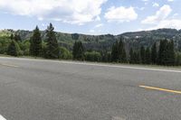 Majestic Mountains and Asphalt Road in Colorado Landscape 002