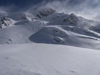 Majestic Mountains in a Snow Clear Sky