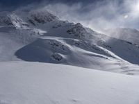 Majestic Mountains in a Snow Clear Sky