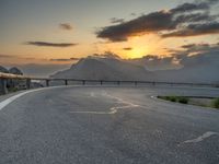 Majorca, Spain: Road Curving Under Sunny Sky