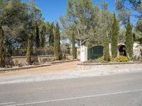 this gate is the focal point at the entrance to the home for a great family