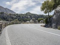 Mallorca Mountains: Asphalt Road Amidst a Picturesque Landscape